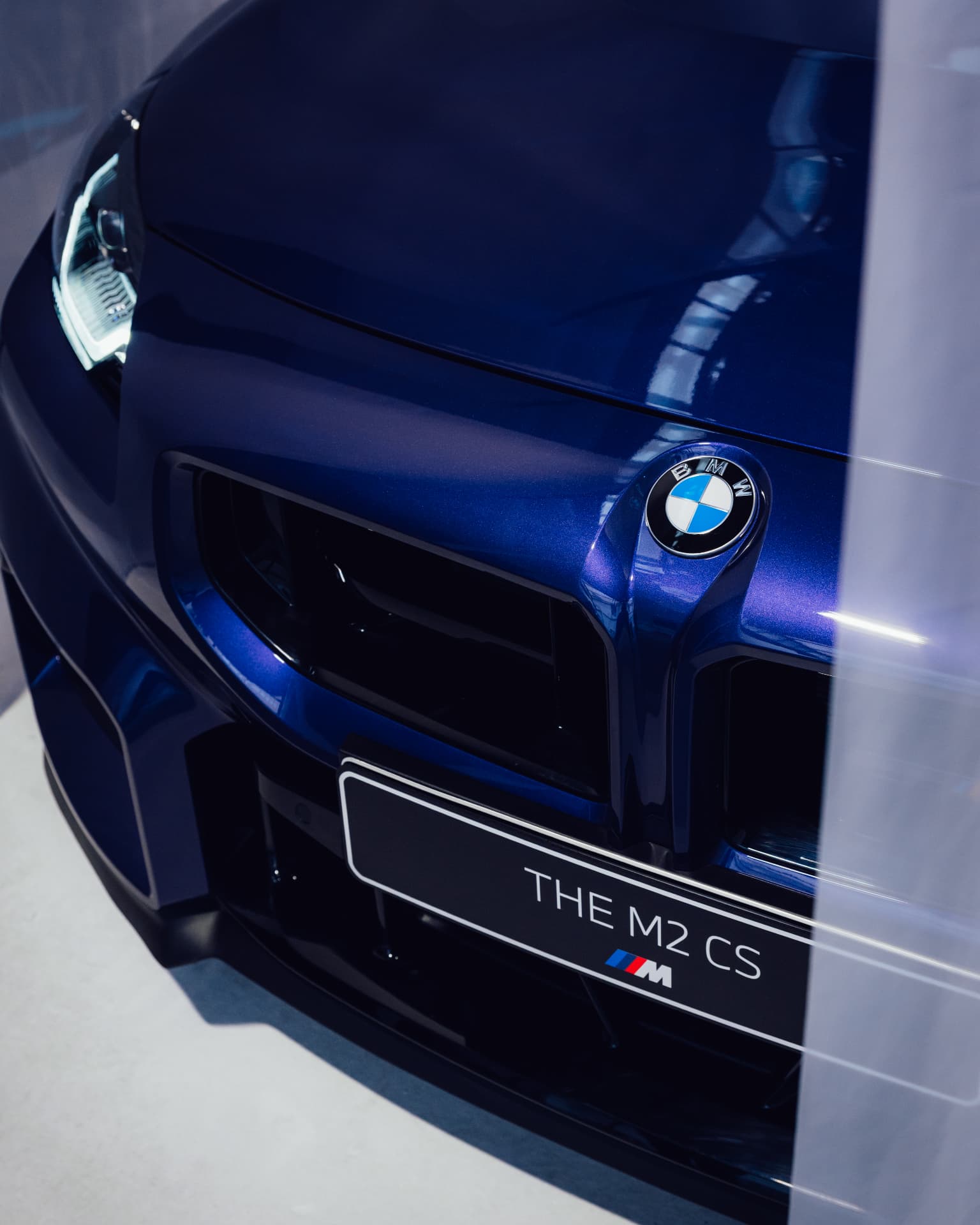 Front detail of THE M2 CS with BMW roundel on the hood and M badge at IAA 2025