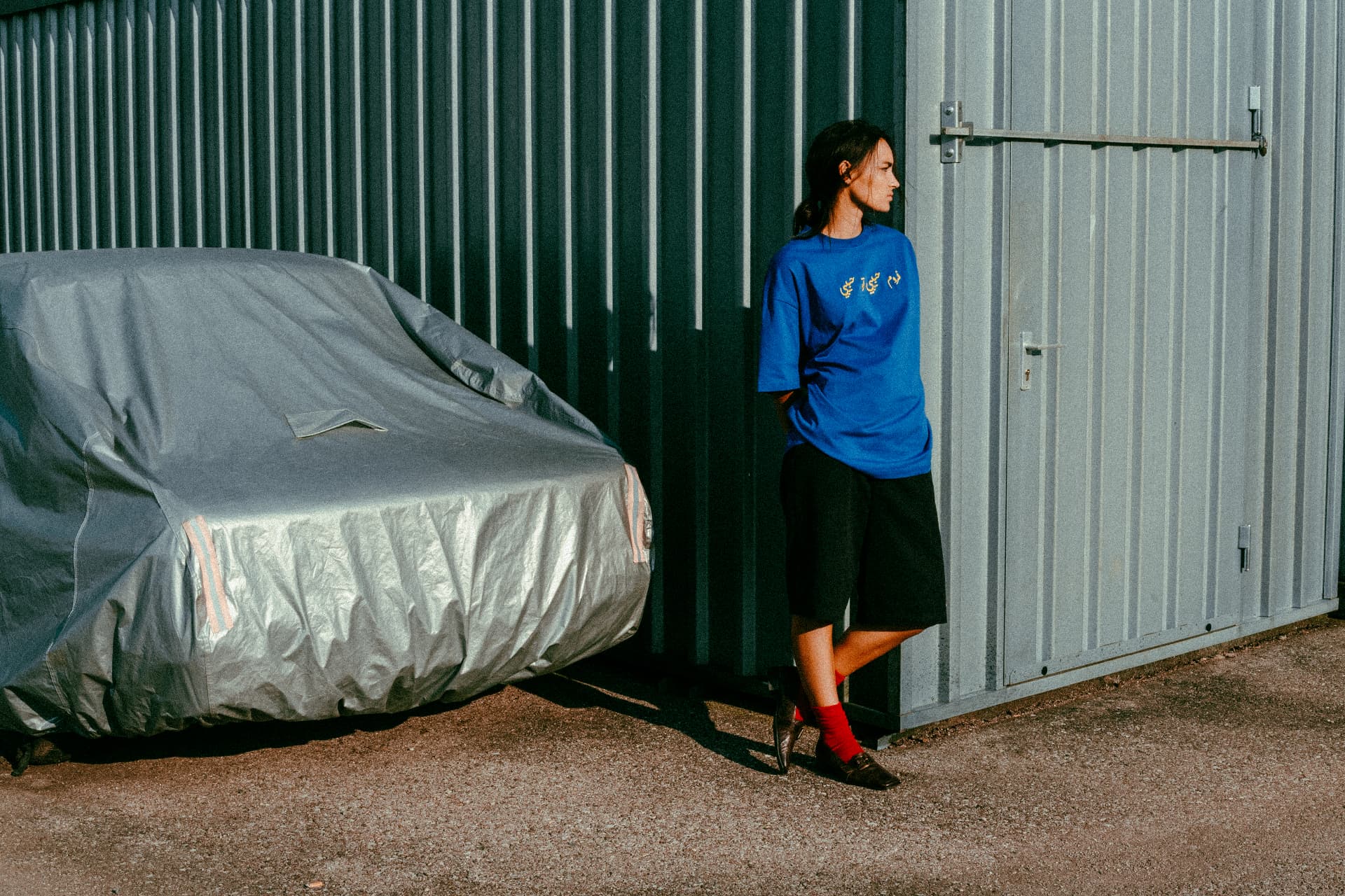 From Habibi to Habibi fashion photograph 13 — against a weathered wall