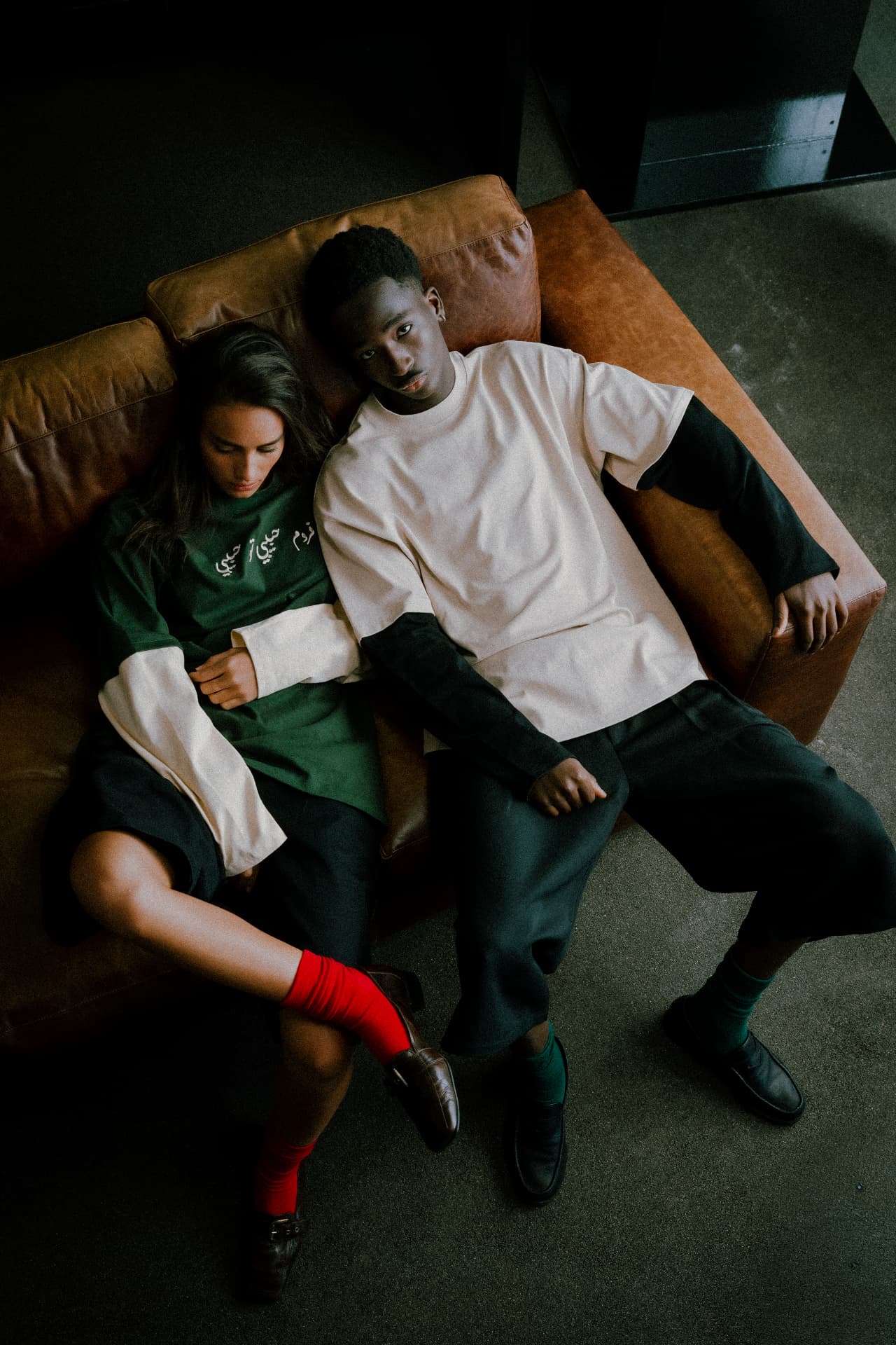From Habibi to Habibi fashion photograph 3 — on a worn couch placed outdoors