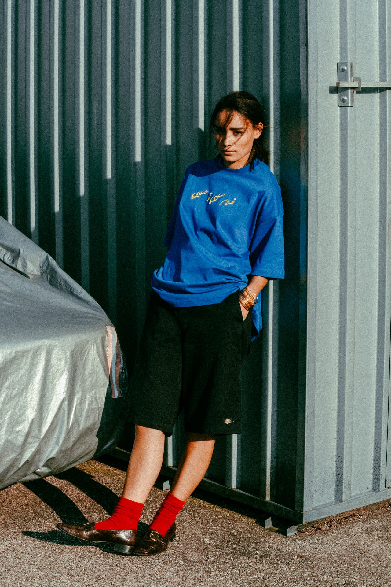 From Habibi to Habibi fashion photograph 11 — against a weathered wall
